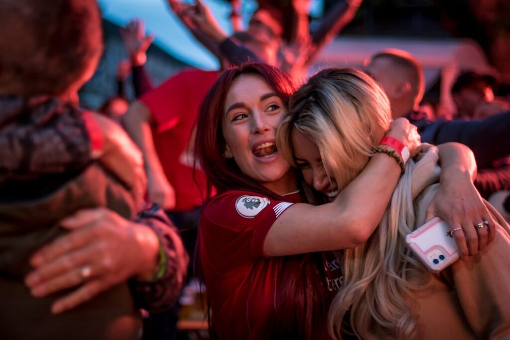 Liverpool FC Fans Celebrating at Hotel Anfield on a Matchday